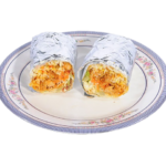 Middle Eastern chicken shawarma wraps rolled in foil and cut open