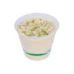 Chilled mint rice yogurt sauce in a takeout container