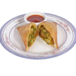Halal minced beef samosas on a white background