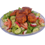 Halal chicken kofta meatballs served fresh with a side salad