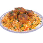 Spiced Halal chicken biryani rice plate on a white isolated background