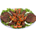 Mixed meat combo kabob platter with basmati rice and fresh greens